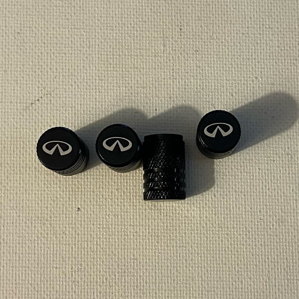 Infinity valve Stem caps in black set of 4 NWT